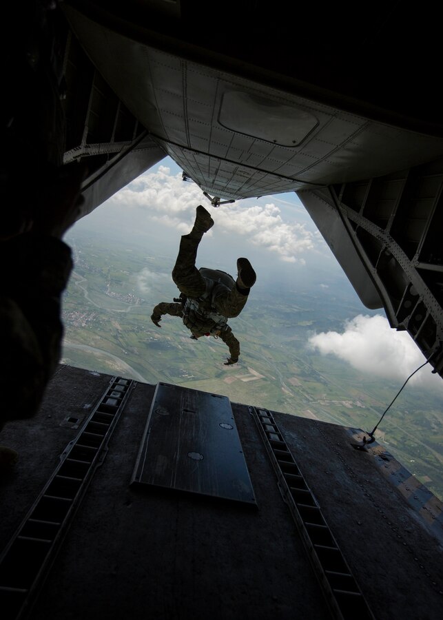 Philippine Army Maj. Velmor Manaois, Light Reaction Regiment, Special Operations Command, conducts a free fall jump from a U.S. Marine Corps CH-53 Super Stallion during Amphibious Landing Exercise 15 (PHIBLEX 15) at Basa Air Base, Philippines, Oct. 7, 2014. PHIBLEX is an annual, bilateral training exercise conducted by the Armed Forces of the Philippines, U.S. Marines and Navy to strengthen interoperability across a range of capabilities to include disaster relief and contingency operations. (U.S. Marine Corps photo by Sgt. William L. Holdaway/Released)