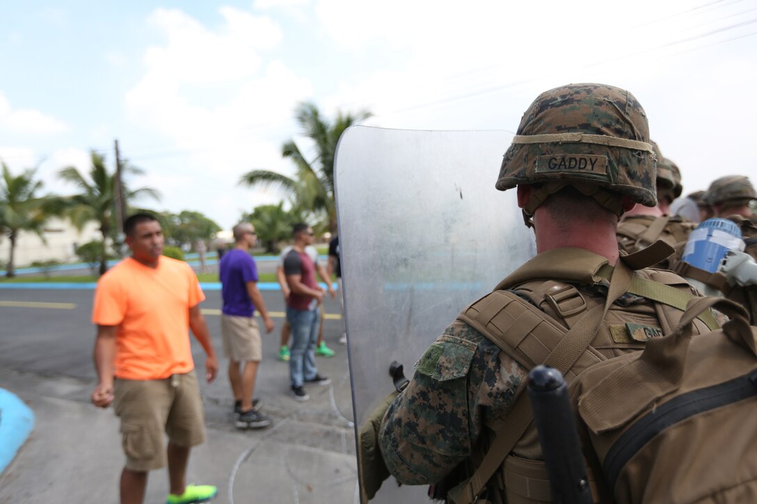 U.S. Marines set up a simulated embassy reinforcement during Amphibious Landing Exercise 2015 at Clark Air Base in the Philippines, Oct. 2, 2014. PHIBLEX 15 is an annual, bilateral training exercise conducted by the Armed Forces of the Philippines alongside U.S. Marine and Navy forces to strengthen interoperability across a range of military operations to include disaster relief and contingency operations. The Marines are with Co. K, Battalion Landing Team 3rd Battalion, 5th Marines, 31st Marine Expeditionary Unit. (U.S. Marine Corps photo by Lance Cpl. Richard Currier)