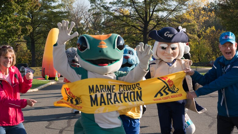 Mascot finish their race during the Marine Corps Marathon Kids Run Nov. 25 at the Pentagon in Arlington, VA.  The event offered a host of activities and tons of free items given away as well as a few special guest including the marathon’s mascots, Miles and Molly and Cpl. Chesty XVI, the Marine Corps Mascot. 