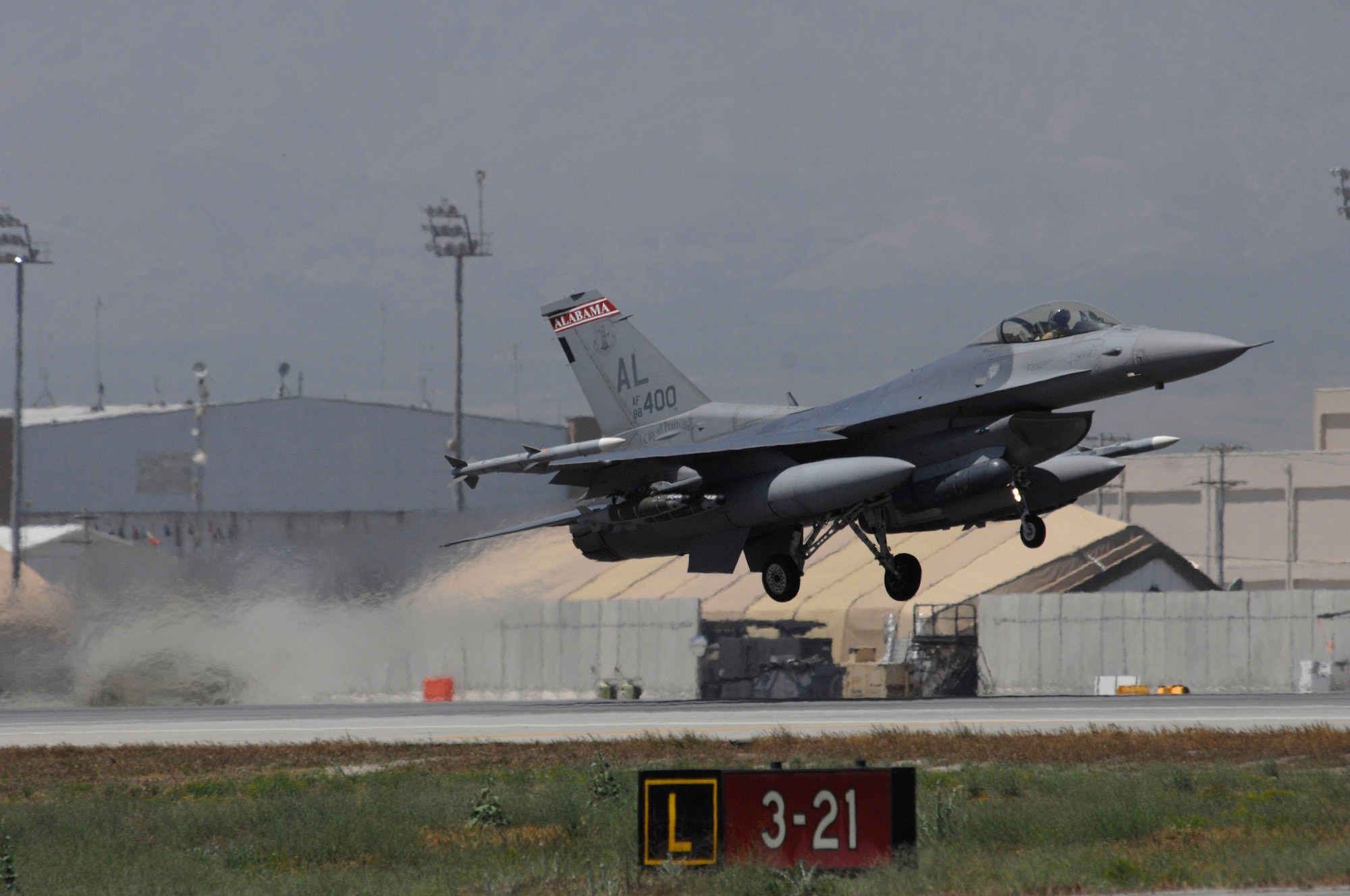 A U.S. Air Force F-16 Fighting Falcon takes off at Bagram Airfield, Afghanistan May 9, 2014.  Deployed service members help operate 46 different types of aircraft in-and-out of the buisiest single runway airfield in the Department of Defense. (U.S. Air Force photo by Master Sgt. Cohen A. Young/Released)