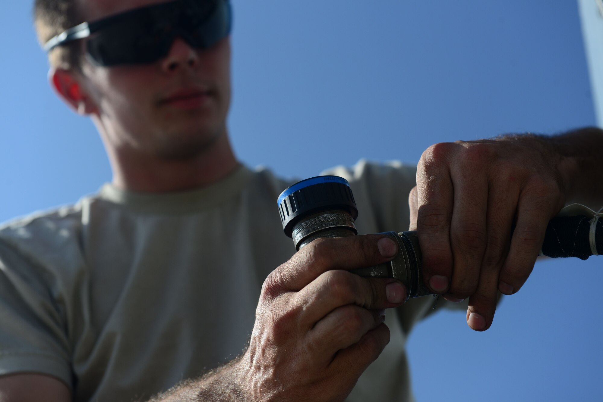 U.S. Air Force Senior Airman David Forker, 455th Expeditionary Aircraft Maintenance avionics systems technician, works on an A-10 Thunderbolt aircraft at Bagram Airfield, Afghanistan Oct. 24, 2014.  Forker deployed from Fort Wayne, Indiana Air National Guard, is responsible for ensuring the A-10 is mission ready and able to perform close air support mission throughout Afghanistan in support of Operation Enduring Freedom. (U.S. Air Force photo by Staff Sgt. Evelyn Chavez/Released)