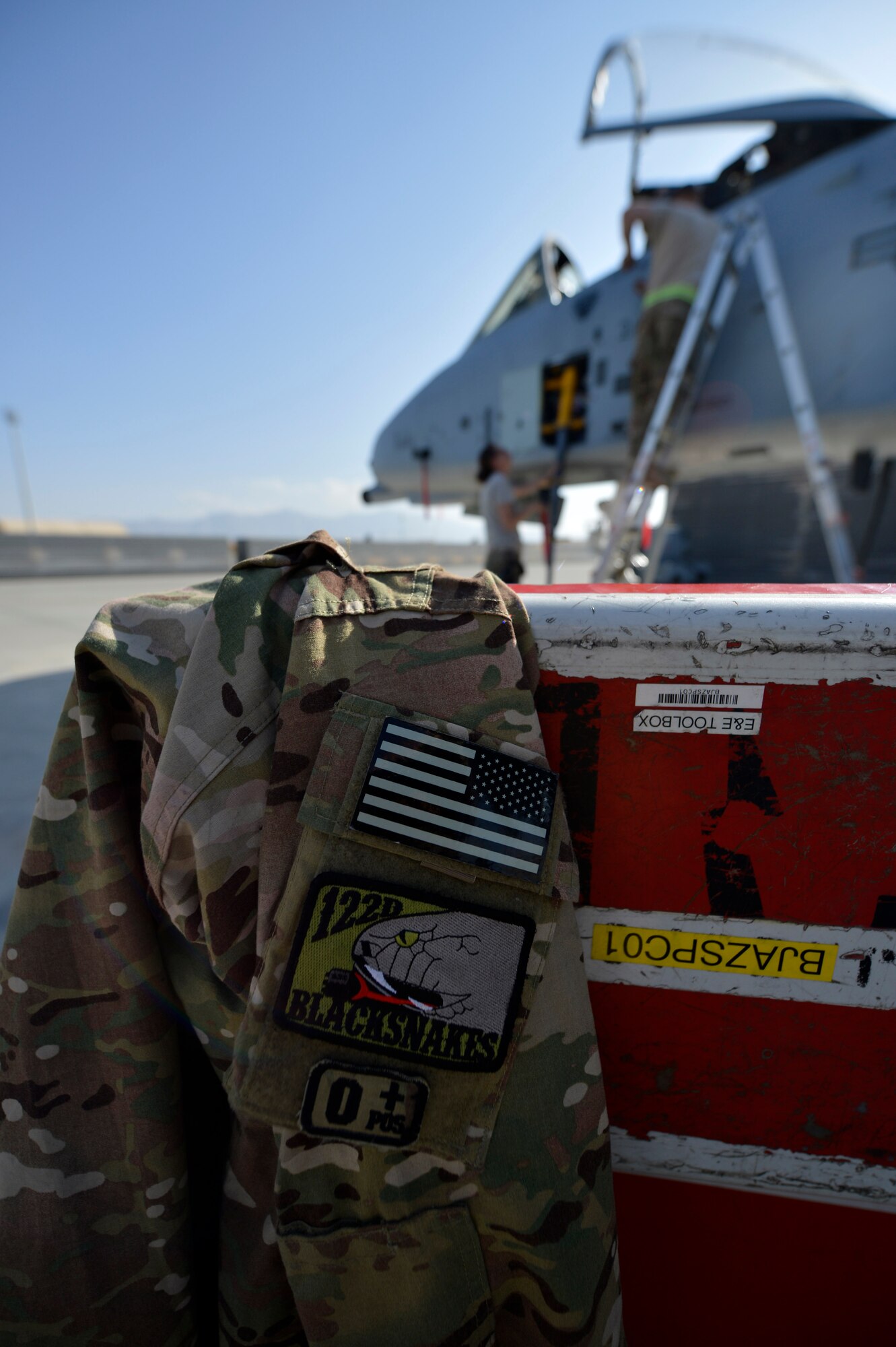 U.S. Air Force Senior Airmen with the 455th work on an A-10 Thunderbolt aircraft at Bagram Airfield, Afghanistan Oct. 24, 2014.  Aircraft maintainers are responsible for ensuring the A-10 is mission ready and able to perform close air support mission throughout Afghanistan in support of Operation Enduring Freedom. (U.S. Air Force photo by Staff Sgt. Evelyn Chavez/Released)