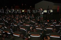 Capt. Brian Geisen, the Marine Corps Detachment’s Alpha Company commander here, discusses the Beirut, Lebanon bomb attack with students assigned to his company following a commemorative run on Oct. 23.