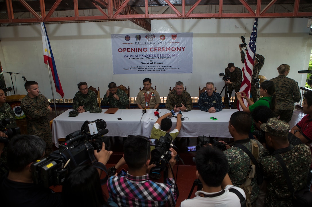 U.S. Marine Corps Brig. Gen. Paul Kennedy, commanding general, 3rd Marine Expeditionary Brigade, Armed Forces of the Philippines (AFP) Brig. General Armando Banez, commander for 3rd Marine Brigade, AFP Rear Adm. Alexander Lopez, commander, Western Command, Philippine Navy, and U.S. Navy Rear Adm. Hugh Wetherald, Commander Expeditionary Strike Group 7, answer questions at a press conference held after the opening ceremony of Amphibious Landing Exercise (PHIBLEX) 15 in Palawan, Philippines, September 29, 2014. PHIBLEX is an annual, bilateral training exercise conducted by the Armed Forces of the Philippines, U.S. Marines and Navy to strengthen interoperability across a range of capabilities to include disaster relief and contingency operations. (U.S. Marine Corps photo by Pfc. Matthew Casbarro/RELEASED)