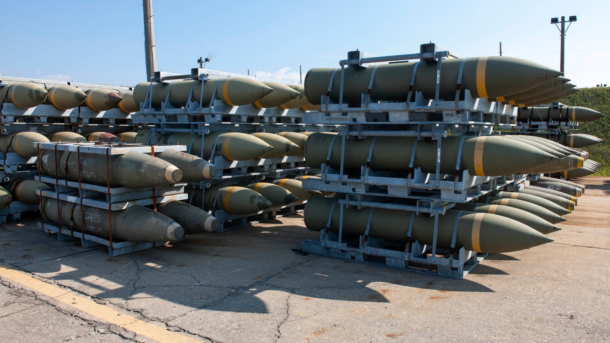 More than 80 Blu-109 and Mark-84 bombs sit on display at the Kunsan Air Base Munitions Storage Area, following a successful emergency destruction of munitions simulation, Oct. 23, 2014. Wolf Pack Airmen completed hands-on emergency destruction of munitions training in conjunction with Exercise Beverly Midnight 15-1. (U.S. Air Force photo by Senior Airman Katrina Heikkinen/Released)