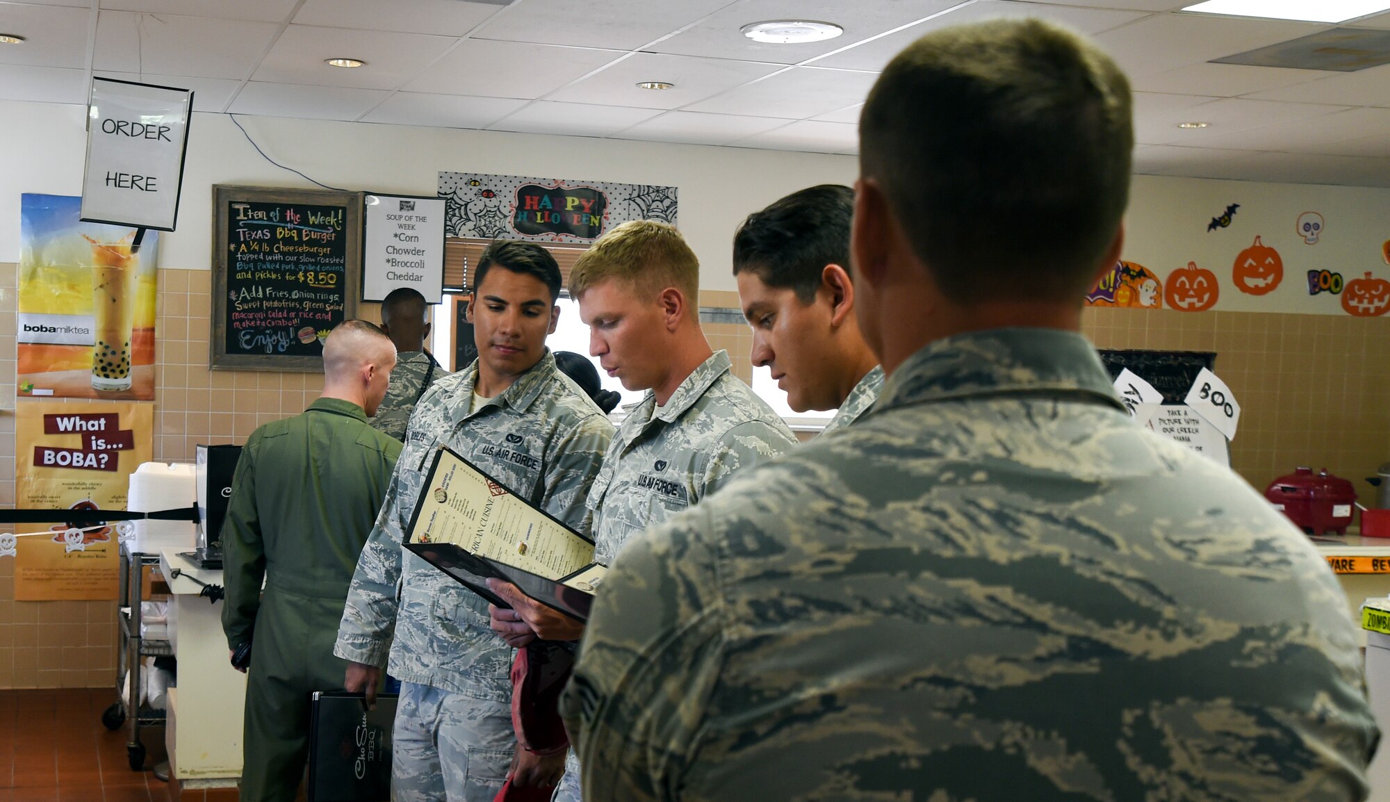 Airmen line up to order lunch at Cho Sun BBQ Oct. 22, 2014, at Creech Air Force Base, Nevada. Cho Sun BBQ provides Korean and American cuisine and is open Monday through Friday from 8 a.m. to 8 p.m. Starting Nov. 8, Cho Sun BBQ will also start operating every Saturday from 11 a.m. to 5 p.m. (U.S. Photo by Tech. Sgt. Shad Eidson/Released)