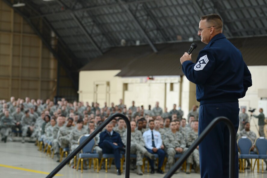 Chief Master Sgt. Harold Hutchison, Pacific Air Force command chief, shares his leadership expectations with enlisted Airmen at Yokota Air Base, Japan, Oct. 23, 2014. Hutchison stressed the importance of Yokota’s presence in the Pacific region and thanked Airmen for the work they do every day. (U.S. Air Force photo by Staff Sgt. Cody H. Ramirez/Released) 