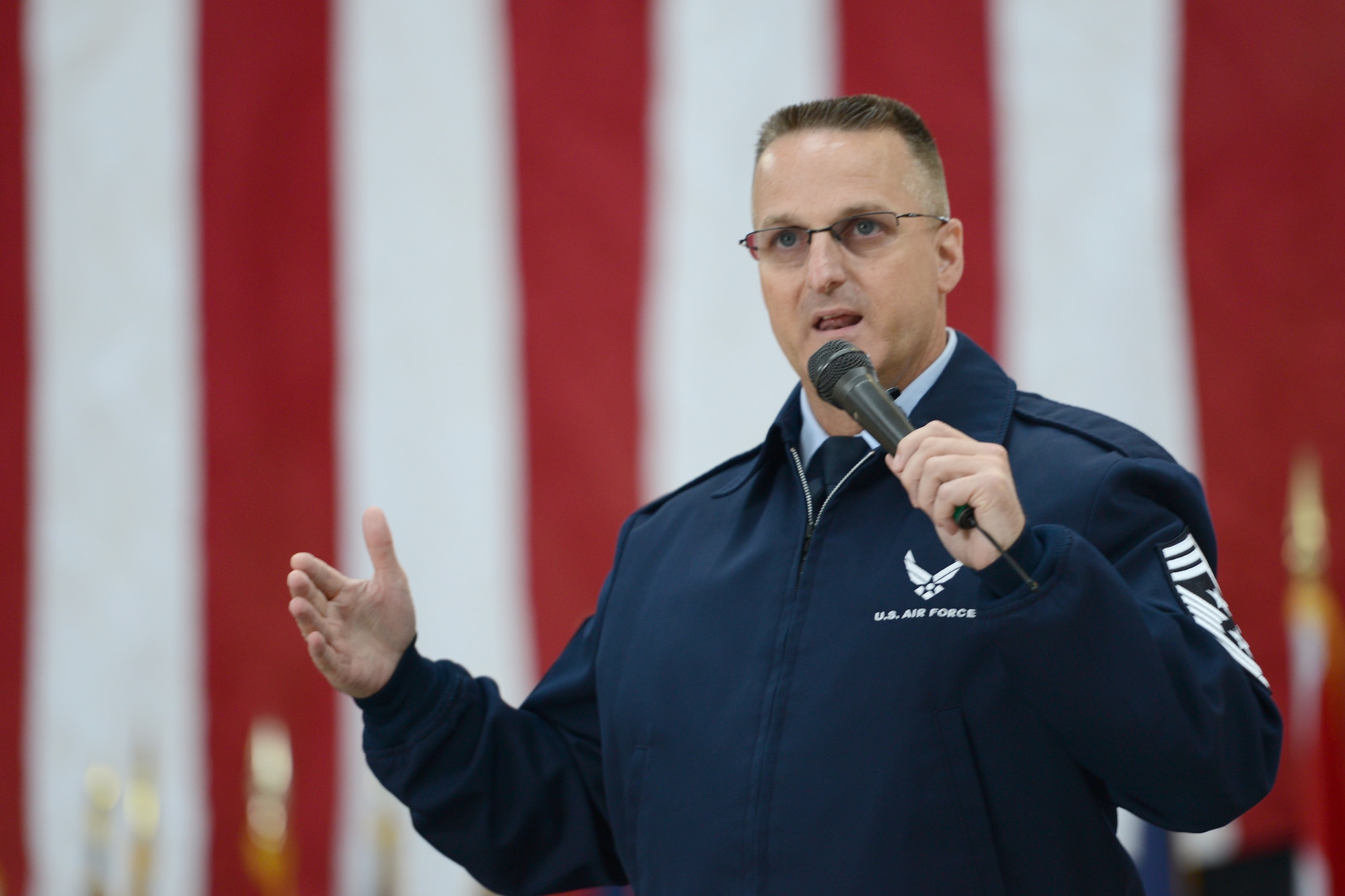 Chief Master Sgt. Harold Hutchison, Pacific Air Force command chief, speaks to Airmen at Yokota Air Base, Japan, Oct. 23, 2014. Hutchinson recently filled his position at PACAF and ventured to Yokota to interact with Airmen and inform them of his leadership vision. (U.S. Air Force photo by Staff Sgt. Cody H. Ramirez/Released)