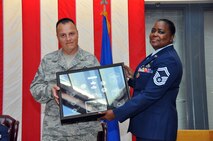 TRAVIS AIR FORCE BASE, Calif. -- Senior Master Sgt. Veronica Cador, chief of customer support for the 349th Force Support Squadron retired after 33 years of service on October 25, 2014, at Travis Air Force Base, Calif. (U.S. Air Force photos/Staff Sgt. Cindy G. Alejandrez)