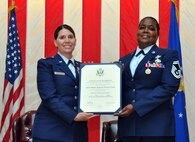 TRAVIS AIR FORCE BASE, Calif. -- Senior Master Sgt. Veronica Cador, chief of customer support for the 349th Force Support Squadron retired after 33 years of service on October 25, 2014, at Travis Air Force Base, Calif. (U.S. Air Force photos/Staff Sgt. Cindy G. Alejandrez)