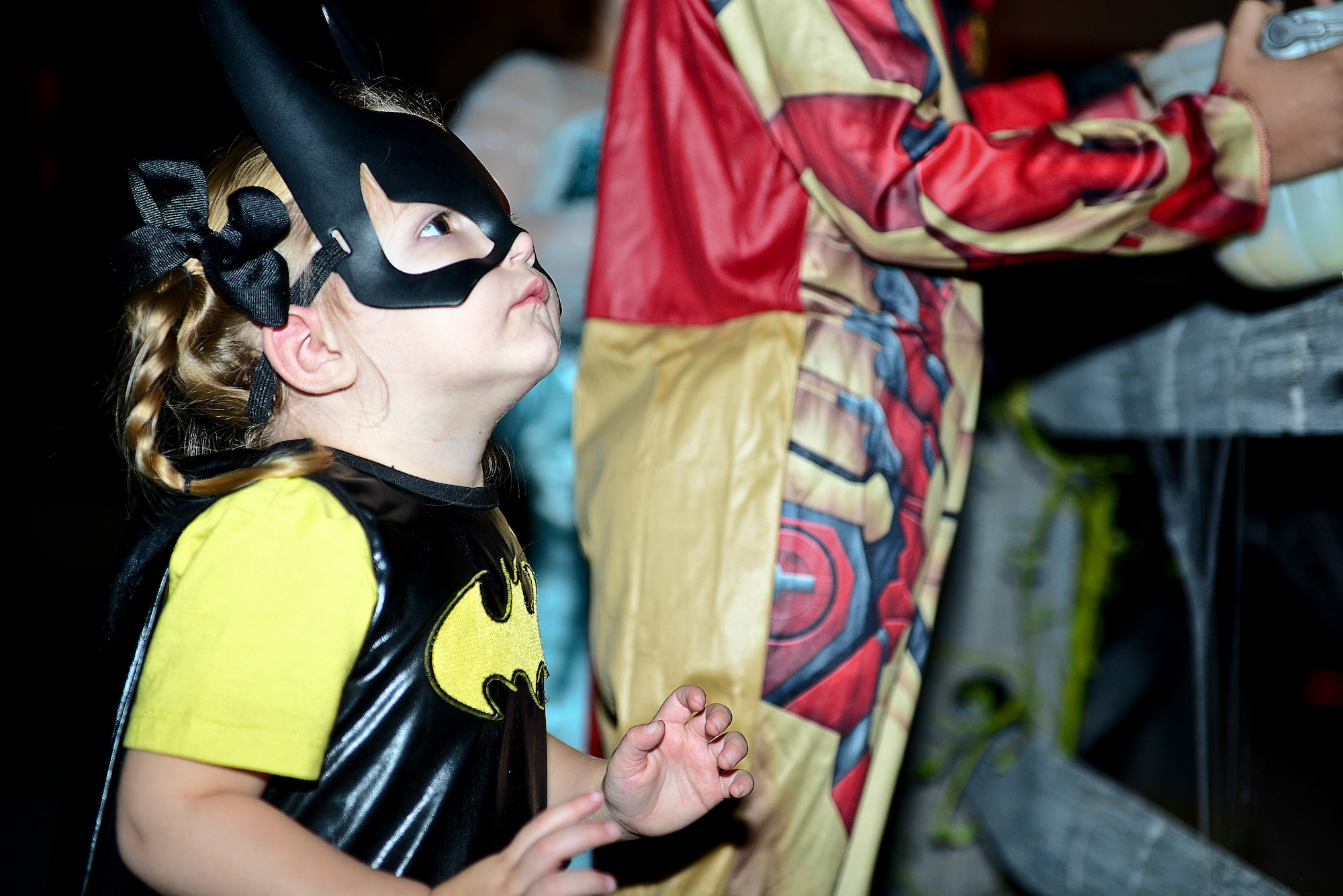 Abigail Godfrey, 2, watches as volunteers acting as mannequins come to life during the Night at the Transportation Museum event at Fort Eustis, Va., Oct. 27, 2014. Children ages 12 and under were able to experience the spookily-decorated museum while collecting candy. (U.S. Air Force photo by Airman 1st Class Kimberly Nagle/Released)