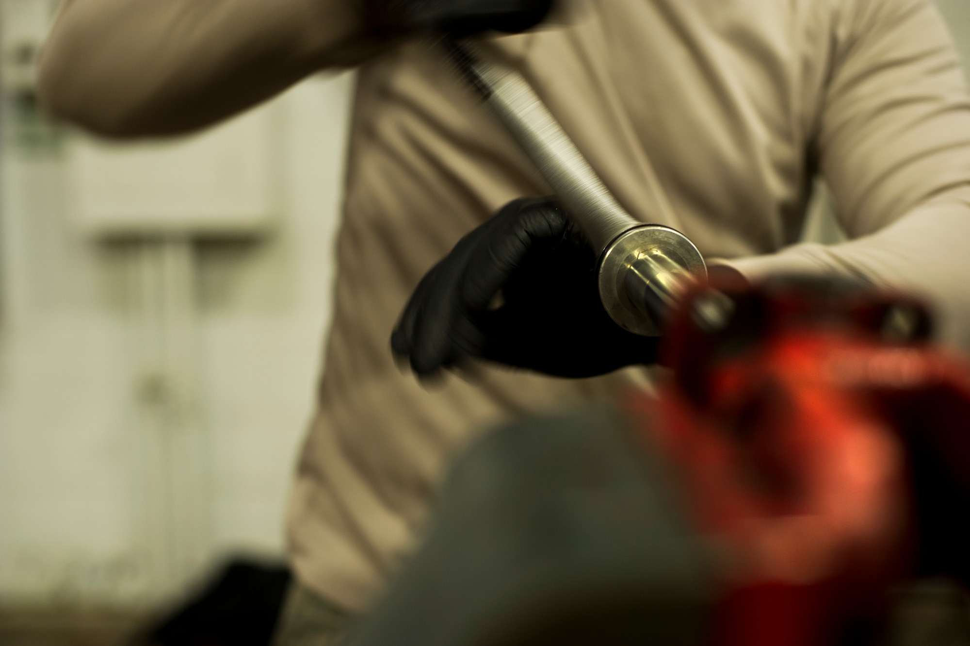 Senior Airman Jordan Gehler, 5th Logistics Readiness Squadron vehicle maintenance journeyman, rebuilds a cylinder on Minot Air Force Base, N.D., Oct. 17, 2014. Vehicle mechanics are responsible for the maintenance of all government-owned vehicles on base. (U.S. Air Force photo/Senior Airman Brittany Y. Bateman) 