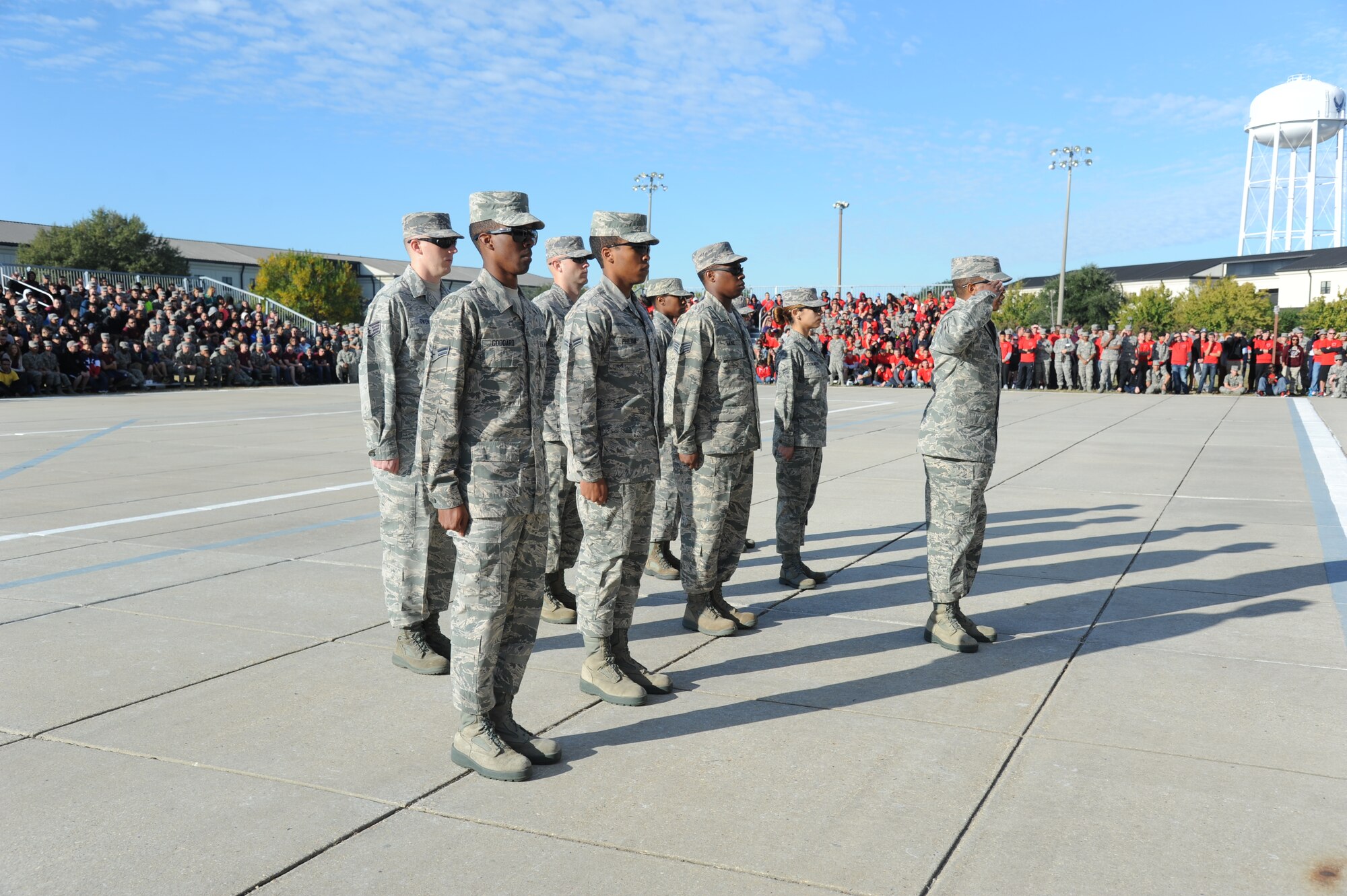 Members of the Permanent Party Dragon Drill Team performs for the first time during the 81st Training Group drill down Oct. 24, 2014, at the Levitow Training Support Facility Drill Pad, Keesler Air Force Base, Miss.  The Permanent Party Dragon Drill Team will also compete in the next 81st TRG drill down. “We have some really stiff competition in the NPS drill teams, especially with the freestyle part of it,” said Master Sgt. Travis Mercadel, permanent party drill team NCOIC. “We were amazed at the talent these young Airmen come up with which makes us want to step up our game.” (U.S. Air Force photo by Kemberly Groue)