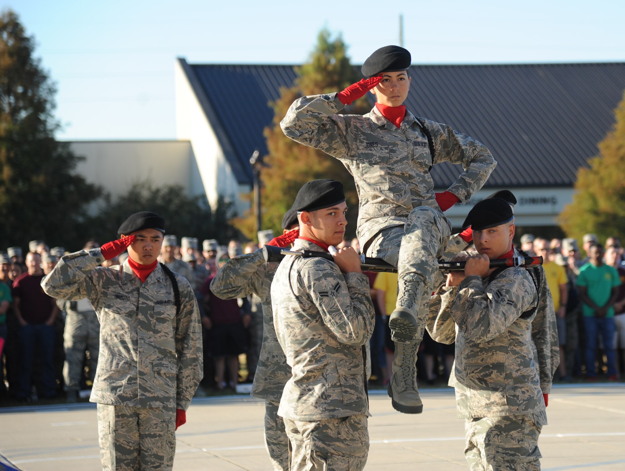 Airman Rianna Jones, 336th Training Squadron, and team members perform during the freestyle portion of the 81st Training Group drill down Oct. 24, 2014, at the Levitow Training Support Facility Drill Pad, Keesler Air Force Base, Miss.  The 336th TRS “Red Wolves” placed first in the freestyle competition.  (U.S. Air Force photo by Kemberly Groue)
