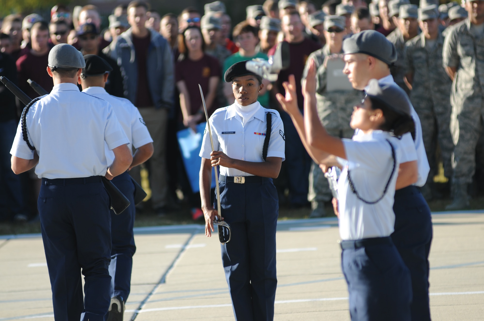 Airman 1st Class Ballad Burroughs, 335th Training Squadron, and team members perform during the freestyle portion of the 81st Training Group drill down Oct. 24, 2014, at the Levitow Training Support Facility Drill Pad, Keesler Air Force Base, Miss.  The 335th TRS “Bulls” placed second in the freestyle competition. (U.S. Air Force photo by Kemberly Groue)