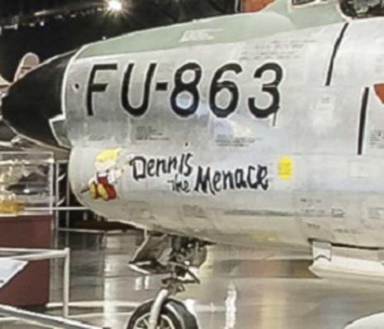 COLD WAR GALLERY - Under a plane with orange wings, find Dennis the Menace. (Screenshot from NMUSAF Virtual Tour)