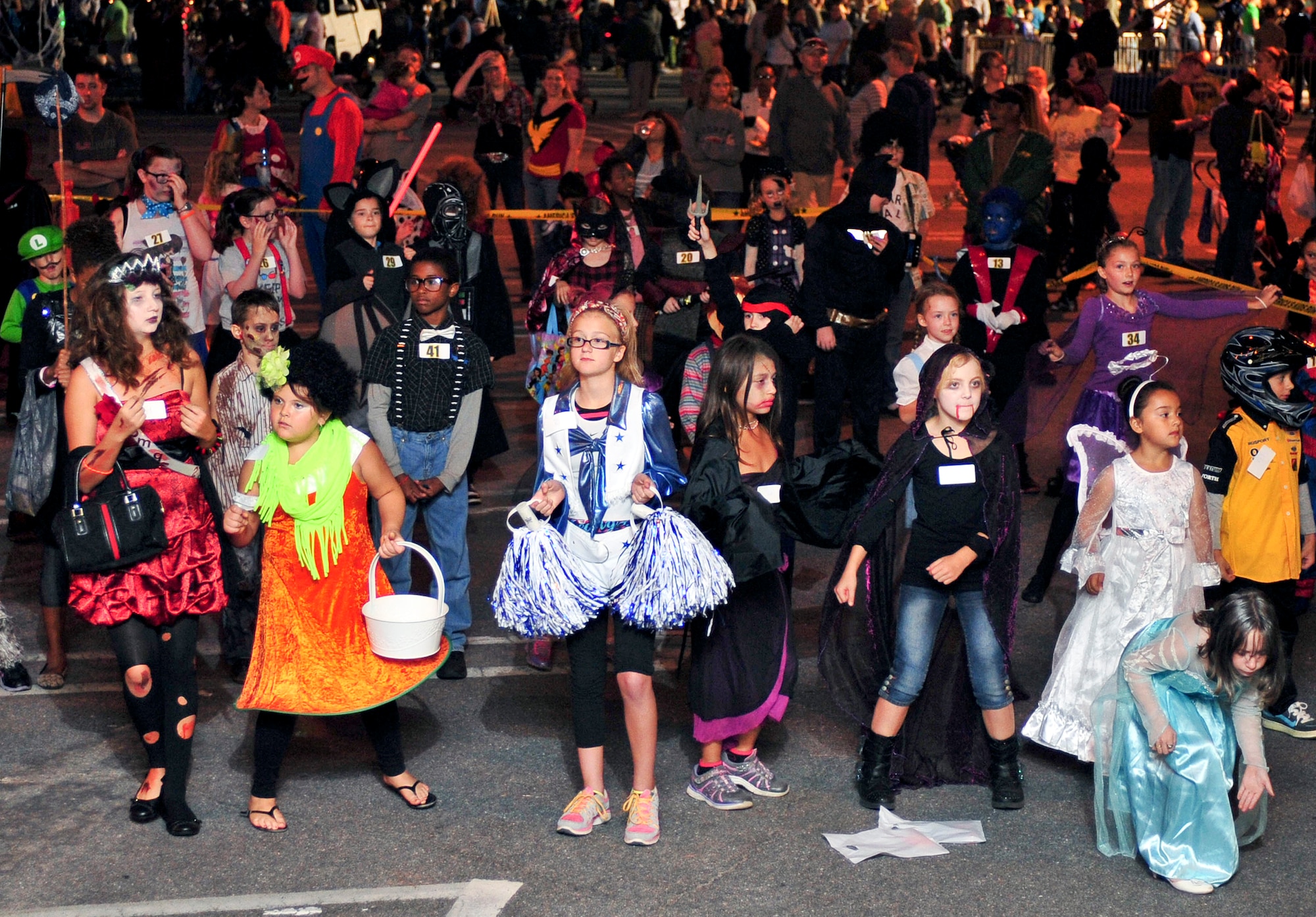 Team Seymour kids show off their dance moves during the Halloween Block Party at Seymour Johnson Air Force Base, North Carolina, Oct. 24. (U.S. Air Force photo/Senior Airman John Nieves Camacho)