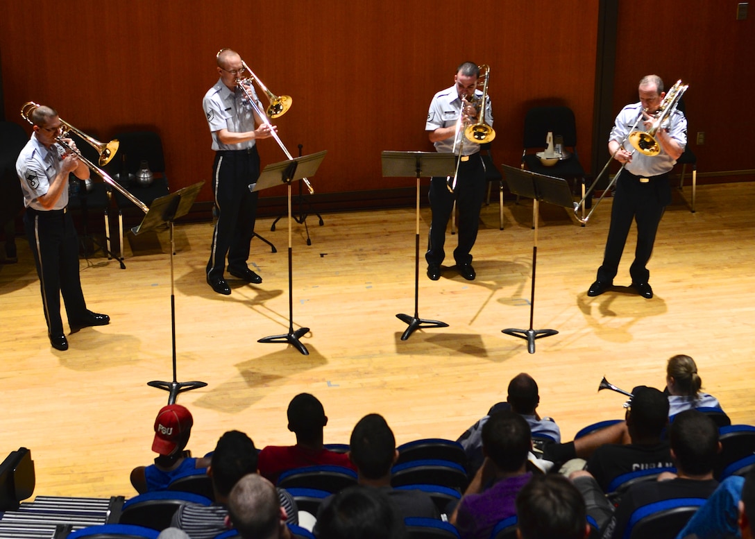 The United States Air Force Band's trombone quartet performs in a concert of chamber music for students at Florida State University, October 15, 2014. This performance is a part of the Band's fall Concert Band and Singing Sergeants tour through the Southeast. (U.S. Air Force photo by Senior Master Sgt. Bob Kamholz/released).