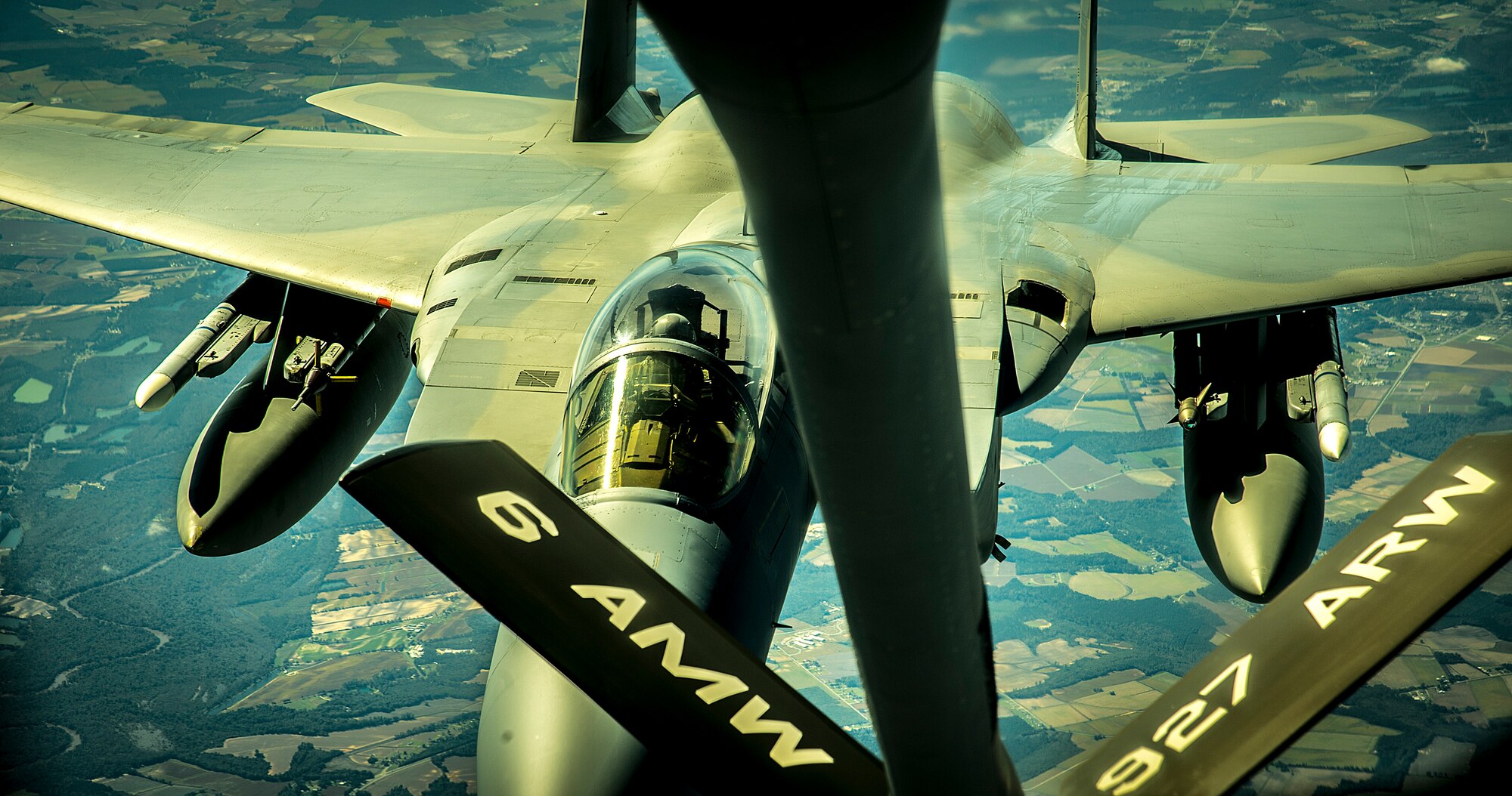 A 125th Fighter Wing U.S. Air Force F-15 Eagle is air refueled enroute to exercise VIGILANT SHIELD 15,  Oct. 20, 2014.The VIGILANT SHIELD field training exercise is a bi-national NORAD Command exercise which provides realistic training and practice for American and Canadian forces in support of respective national strategy for North America’s defense. NORAD ensures U.S. and Canadian air sovereignty through a network of alert fighters, tankers, airborne early warning aircraft, and ground based air defense assets cued by interagency and defense surveillance radars. (U.S. Air Force photo by Tech. Sgt. Brandon Shapiro/Released)