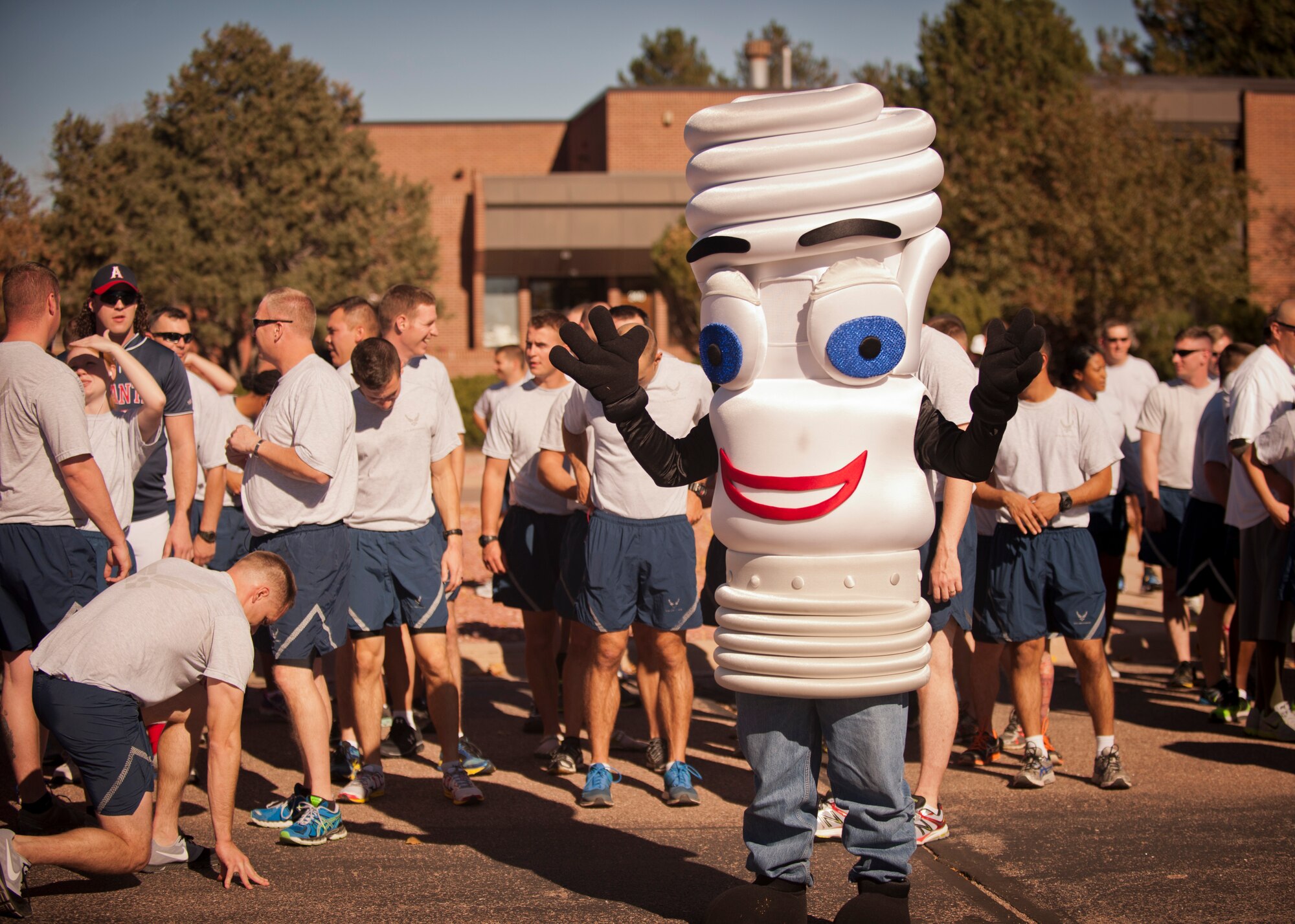 PETERSON AIR FORCE BASE, Colo. – Pete the Light encourages Airmen while also reminding them about the importance of energy conservation before the Spooky Warfit 5K Oct. 24. During the event those who dressed in costume not only ran a 5K but also completed several obstacles that lined the course. (U.S. Air Force photo/Staff Sgt. J. Aaron Breeden)