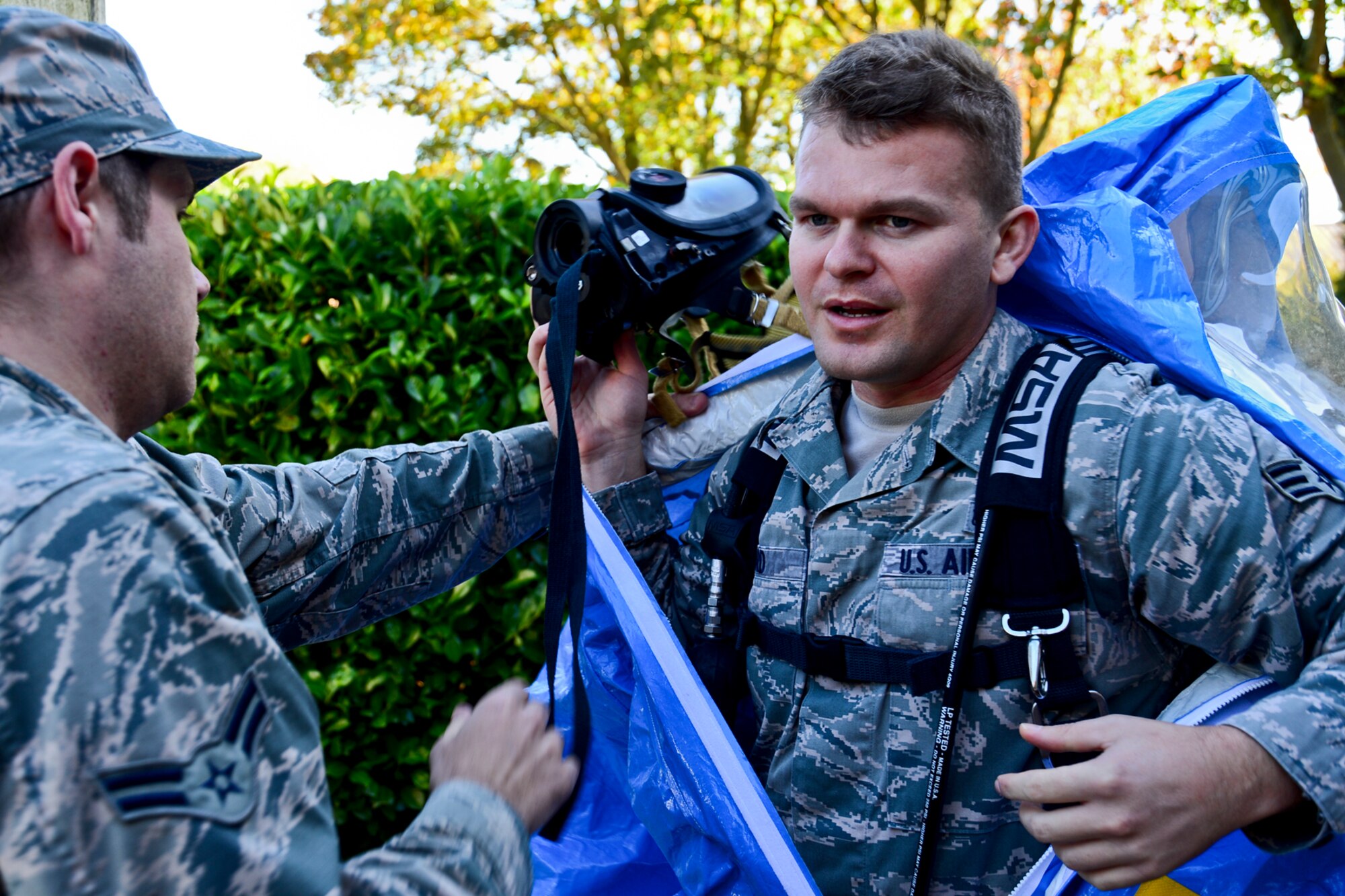Senior Airman Hunter Rivord, 48th Aerospace Medicine Squadron bioenvironmental engineering journeyman, suits up for a chemical, biological, radiological and nuclear response training exercise at Royal Air Force Lakenheath, England, Oct. 28, 2014. Rivord was nominated for a Liberty Spotlight because he displays the core value of Service Before Self. (U.S. Air Force photo by Airman 1st Class Erin R. Babis/Released)