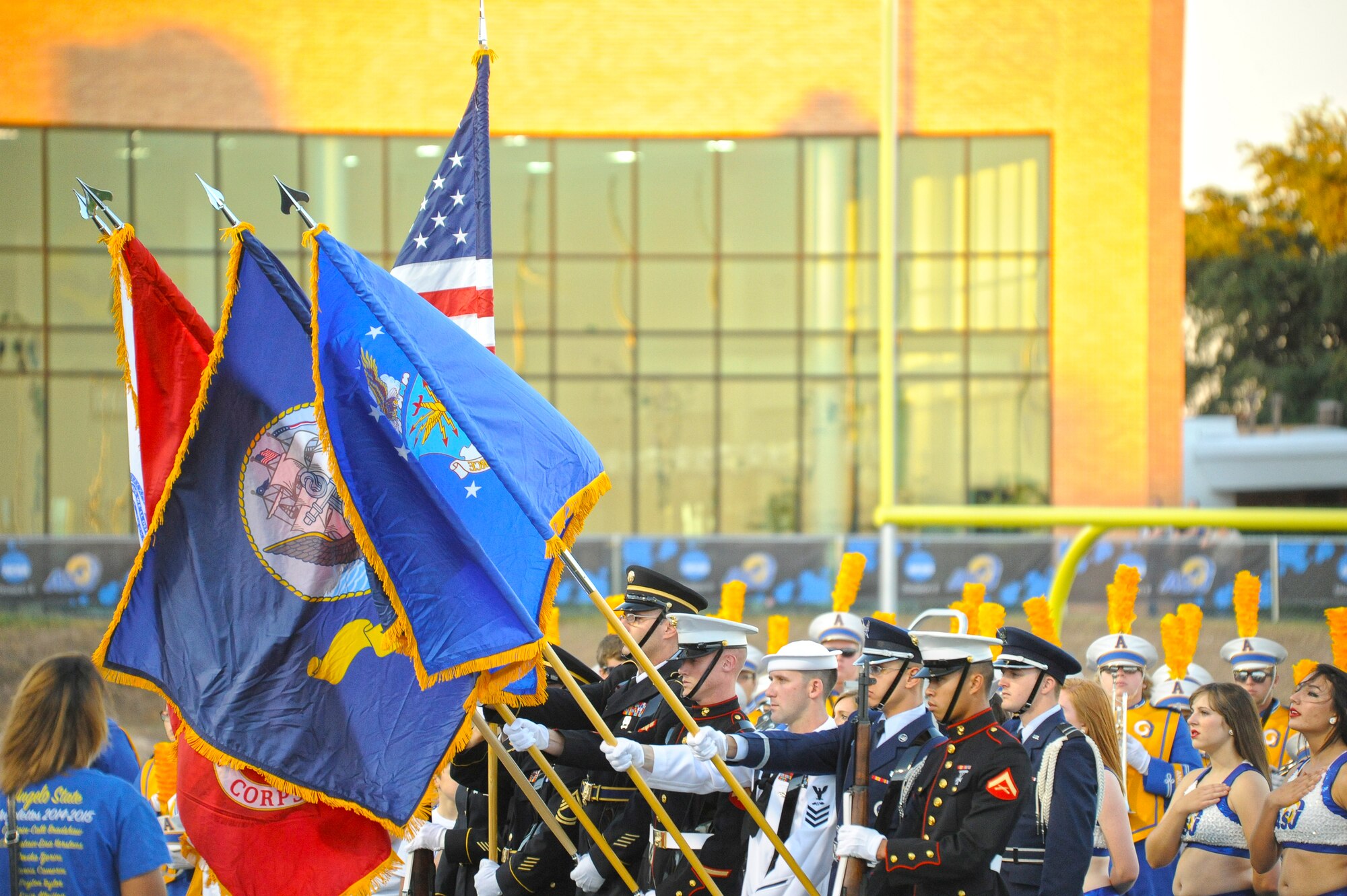 SAN ANGELO, Texas – The Goodfellow Joint Service Color Guard present the colors at the military appreciation day opening ceremony of the Angelo State University vs. Eastern New Mexico University football game Oct. 28. ASU observes an annual military appreciation day that includes free admission for active duty military members.  (U.S. Air Force photo/ Staff Sgt. Austin Knox)