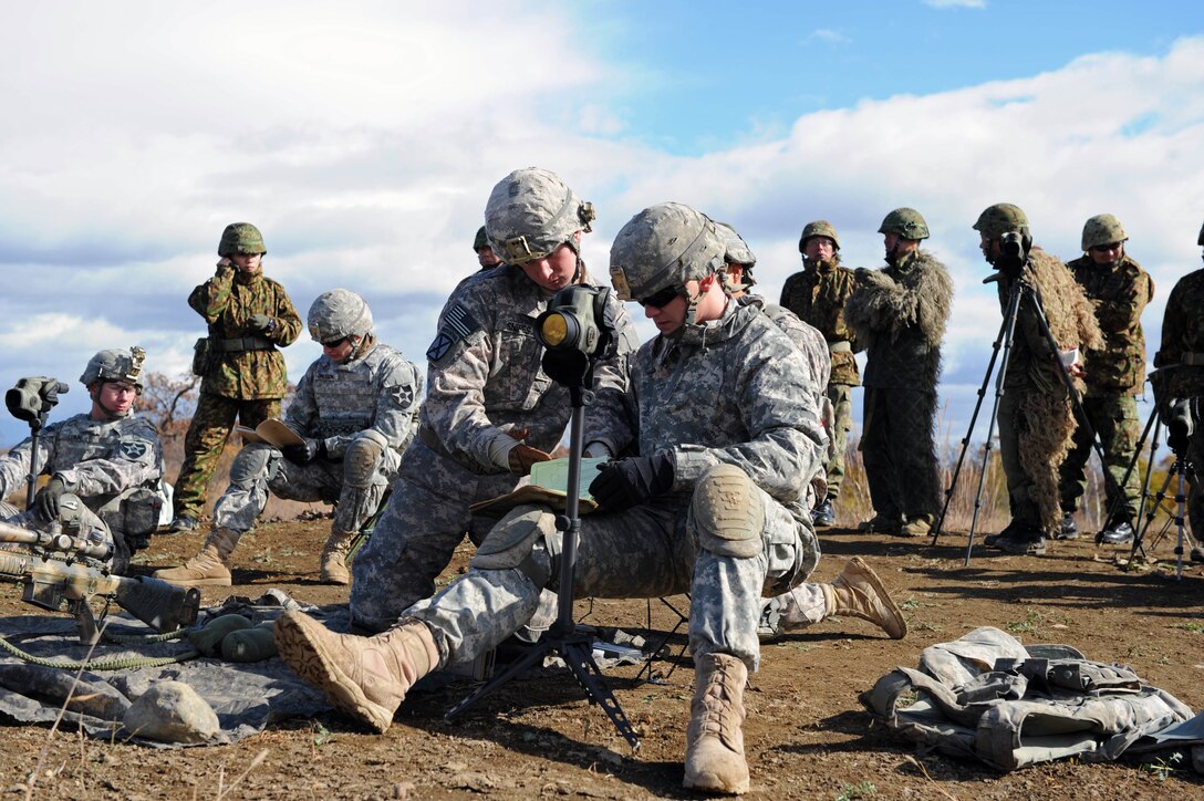 U s army staff sgt perrin snipes left and spc jarret jacobi right