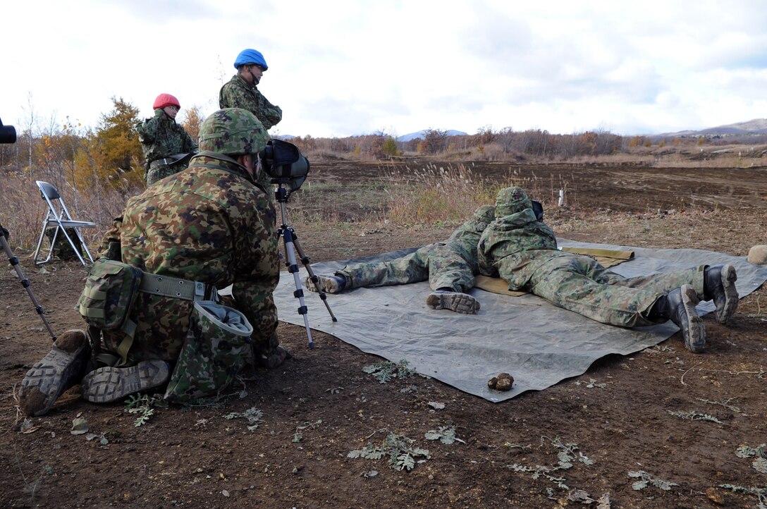 Members of the Japanese ground self-defense force practice target shooting in preparation for a sniper competition during Exercise Orient Shield on Camp Chitose in Hokkaido, Japan, Oct. 28, 2014. 