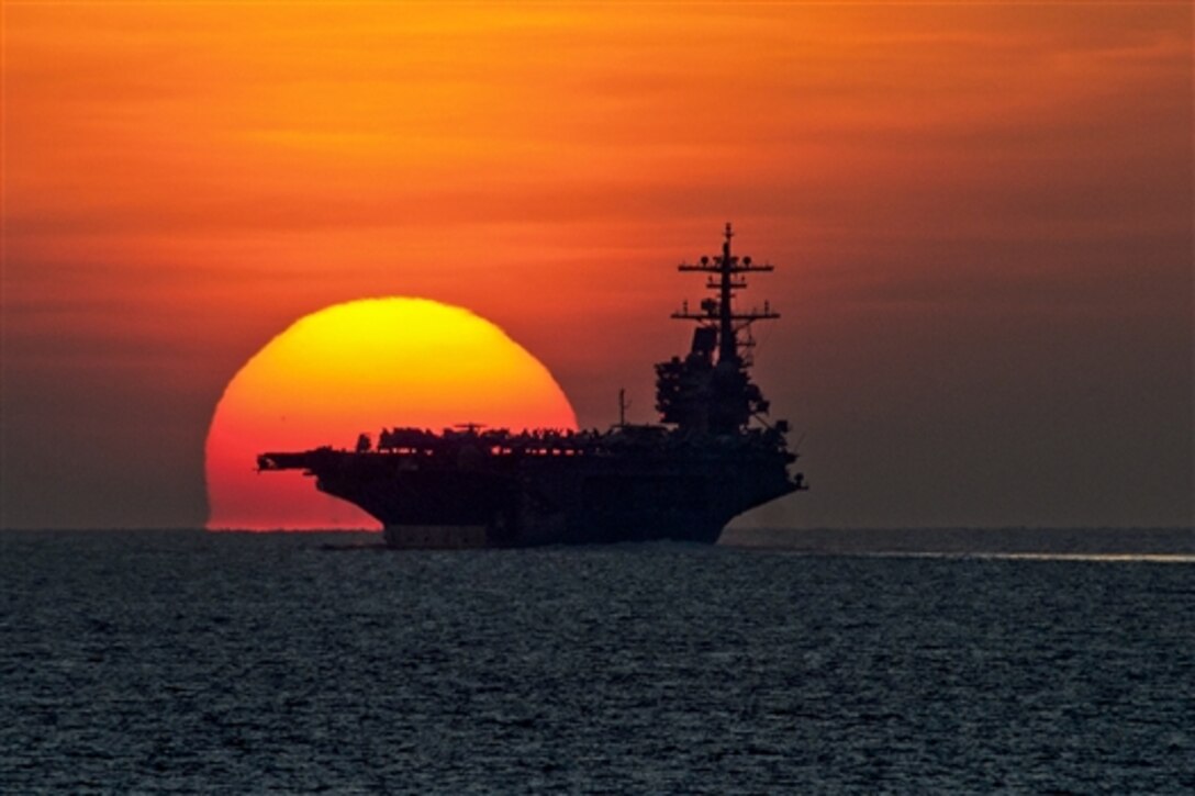U.S. Navy aircraft carrier USS George H.W. Bush travels through the Gulf of Aden, Oct. 23, 2014. The George H.W. Bush Carrier Strike Group is returning to Naval Station Norfolk, Va., after supporting maritime security operations and strike operations in Iraq and Syria.