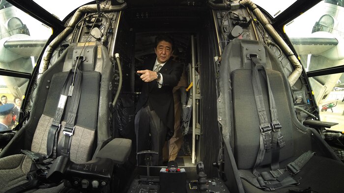 Prime Minister Shinzo Abe views the cockpit of an MV-22B Osprey Hyakuri Air Base during the Japan Air Self Defense Force’s Air Review 2014 Oct. 26. The air review happens every three years showcasing Japan's defensive air assets. Abe is the Prime Minister of Japan. The Osprey is with Marine Medium Tiltrotor Squadron 265, Marine Aircraft Group 36, 1st Marine Air Wing, III Marine Expeditionary Force. 