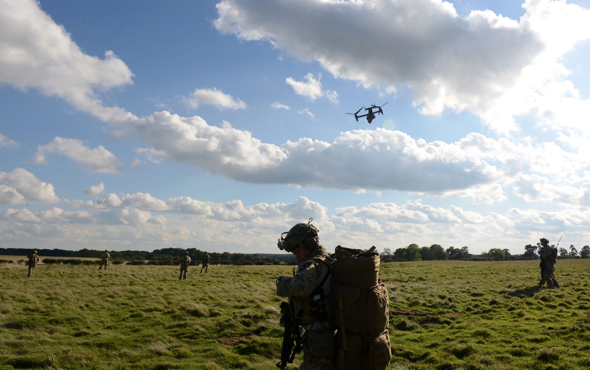 U.S. Air Force special tactics Airmen respond to a simulated village attack during a training exercise Oct. 7, 2014, at Stanford Training Area near Thetford, England. The exercise prepared the team for real-world incidents and consisted of flying in on a CV-22 Osprey, tactically entering the simulated village, rescuing and treating victims, finding and helping hostages, eliminating threats and getting everyone home safely on the Osprey. (U.S. Air Force photo/Senior Airman Kate Maurer/Released)