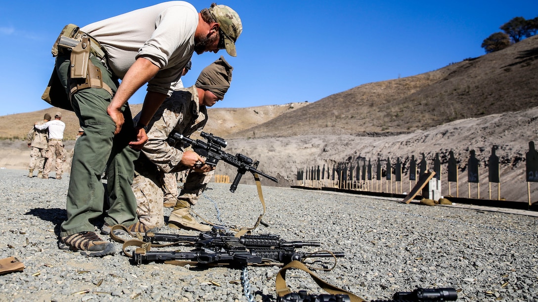 U.S. Marine Cpl. Matthew Miller clears a malfunction while blindfolded during a security element course aboard Camp Pendleton, Calif., Oct. 23, 2014. Miller is a radio operator with Force Reconnaissance Detachment, 15th Marine Expeditionary Unit. Marines in this course are preparing for the 15th MEU’s deployment in the spring. 