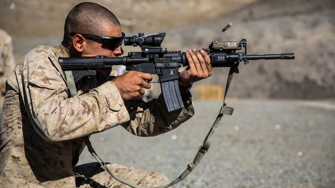 U.S. Marine Pfc. Zachary Dorothy shoots at a target during a security element course aboard Camp Pendleton, Calif., Oct. 23, 2014. Dorothy is an assistant gunner with Battalion Landing Team, 3rd Battalion, 1st Marine Regiment, 15th Marine Expeditionary Unit. Marines in this course are preparing for the 15th MEU’s deployment in the spring. 