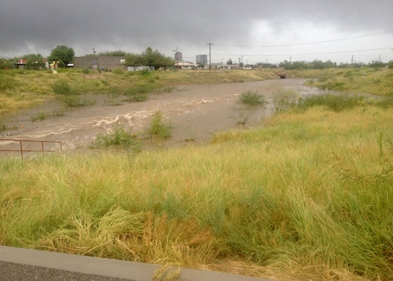 Water flows into a wash which is part of the Arroyo Chico Drainage Area/Arroyo Chico Multi-Use Project built by the U.S. Army Corps of Engineers Los Angeles District during a Sept. 8 rain event in Tucson. Pima County Administrator Chuck Huckelberry sent the L.A. District leadership a letter of appreciation thanking the District for the project because it kept the rain from flooding the downtown Tucson area.  