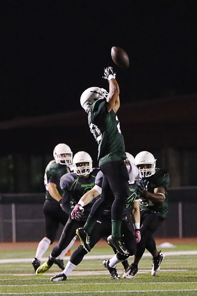 CAMP PENDLETON, Calif. - The Marine Corps Base Spartans secured their spot in the semi-finals with a dominant 38-0 win over the School of Infantry Outlaws during their first game of the playoffs here, Oct. 27. (U.S. Marine Corps photo by Cpl. Shaltiel Dominguez)
