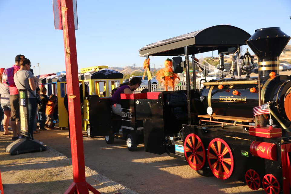 Children board a train at Del Valle Field during the Family Fall Festival, Oct. 24, 2014. Marine Corps Community Services’ special events section took over the Family Fall Festival approximately four years ago and is the biggest event they host.