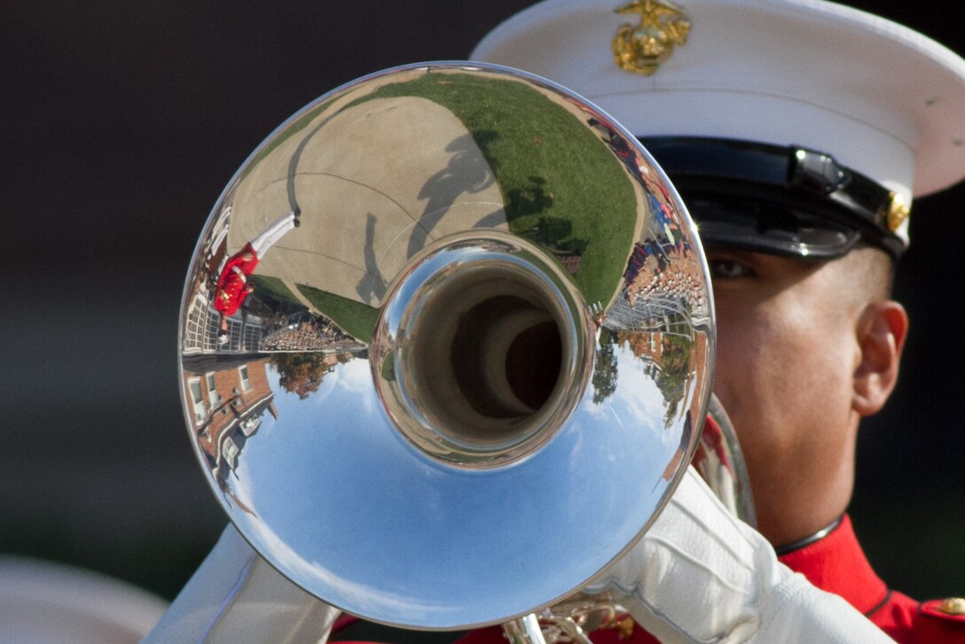 “The Commandant’s Own,” The United States Marine Drum & Bugle Corps performs at Marine Barracks Washington, D.C., during a relief and appointment ceremony at the Barracks, Oct. 29, 2014. During the ceremony, Sgt. Maj. Joseph C. Gray took over responsibilities from Sgt. Maj. Angela M. Maness as the Barracks sergeant major.