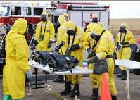 Members of the Malmstrom Air Force Base Chemical, Biological, Radiological and Nuclear Emergency Response Force, or CERF, test equipment for simulated radiation during an exercise held at the base Oct. 27, 2014. CERF is an integrated team combining the skillsets of emergency management and bioenvironmental flights. The exercise was part of Global Thunder 15, a U.S. Strategic Command annual field training and battle staff exercise designed to exercise all mission areas with primary emphasis on nuclear command, control and communications. This field training and battle staff exercise provides training opportunities for components, task forces, units, and command posts to deter and, if necessary, defeat a military attack against the United States and to employ forces as directed by the president. (U.S. Air Force photo/Christy Mason)