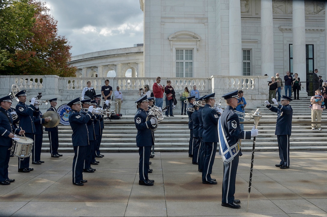 The Ceremonial Brass, under the direction of Captain David Alpar, perform a wreath laying ceremony at Arlington National Cemetery.  The brass can be seen regularly at Arlington performing at funerals for our Nation’s fallen heroes.  (U.S. Air Force Photo/released)