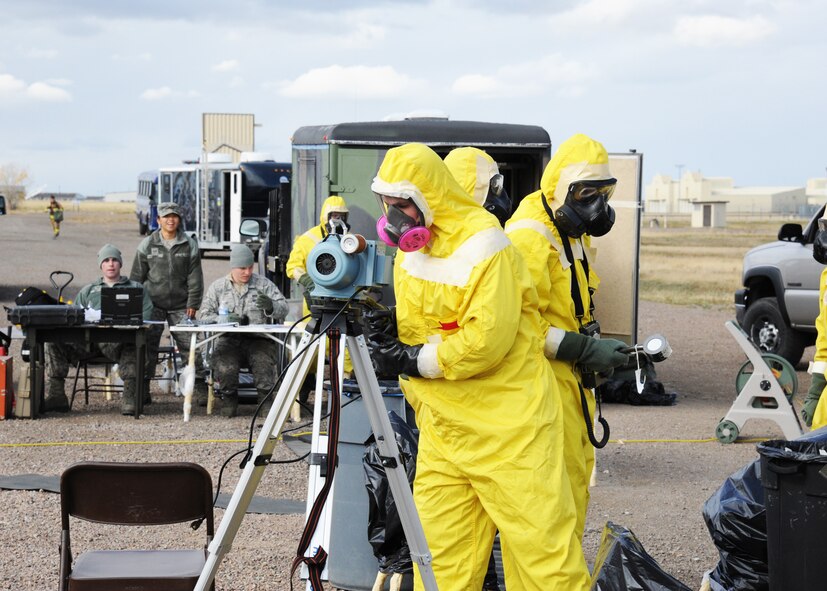 Airman First Class William Raetz, 341st Medical Operations Squadron, collects air quality samples during an exercise held at Malmstrom Air Force Base, Mont. Oct. 27, 2014 as part of Global Thunder 15.  Raetz is part of the Chemical, Biological, Radiological and Nuclear Emergency Response Force, or CERF, who are an integrated team combining the skillsets of emergency management and bioenvironmental flights. Global Thunder is a U.S. Strategic Command annual field training and battle staff exercise designed to exercise all mission areas with primary emphasis on nuclear command, control and communications. This field training and battle staff exercise provides training opportunities for components, task forces, units, and command posts to deter and, if necessary, defeat a military attack against the United States and to employ forces as directed by the president. (U.S. Air Force photo/Christy Mason)