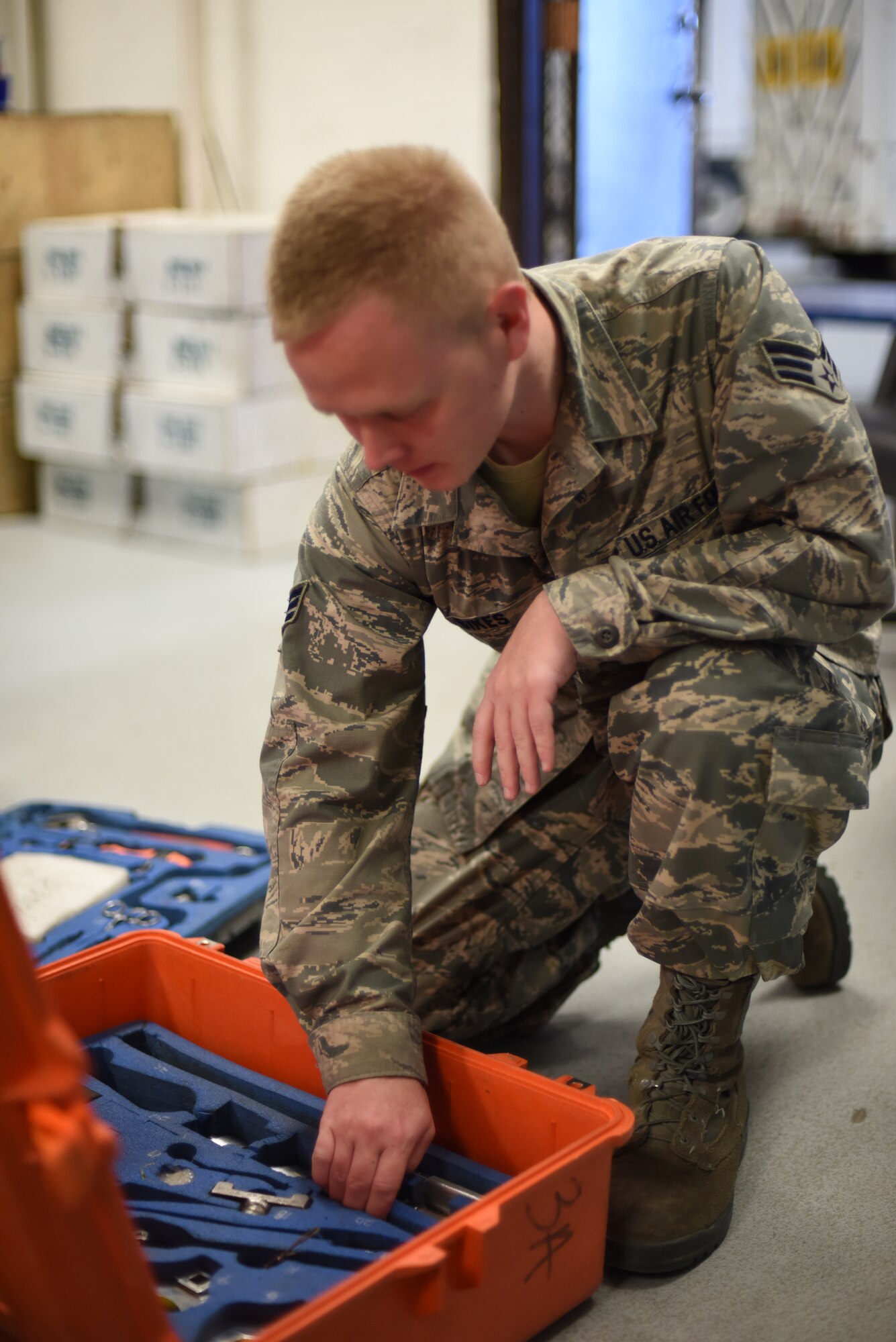 Senior Airman Charles Sikes, 341st Missile Maintenance Squadron missile maintenance team top sider, cleans and organizes a tool kit in support of Exercise Global Thunder Oct. 20, 2014. During the exercise, maintenance personnel reviewed their procedures while performing day-to-day operations. Global Thunder is a U.S. Strategic Command annual field training and battle staff exercise designed to exercise all mission areas with primary emphasis on nuclear command, control and communications. This field training and battle staff exercise provides training opportunities for components, task forces, units, and command posts to deter and, if necessary, defeat a military attack against the United States and to employ forces as directed by the president. (U.S. Air Force photo/Airman 1st Class Collin Schmidt) 