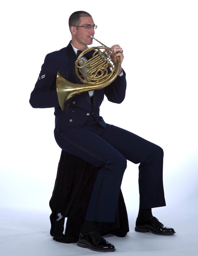 Airman First Class Dan Nebel demonstrates exemplary horn-playing posture at the Golden West Winds photo shoot. (U.S. Air Force photo by GS-09 T.C. Perkins)