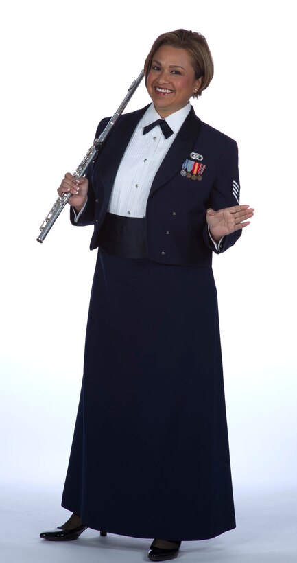 Staff Sgt. Melissa Rocha shows "jazz hands" at the Golden West Winds photo shoot. (U.S. Air Force photo by GS-09 T.C. Perkins)