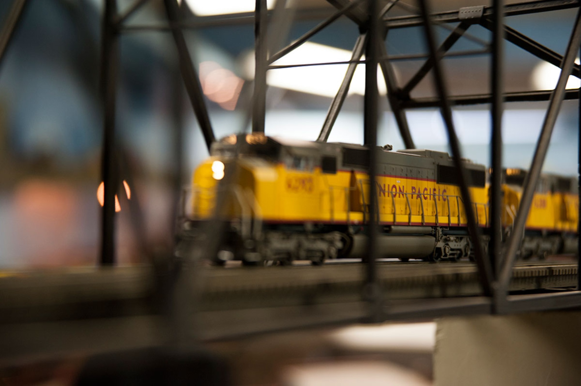 A model Union Pacific train drives over a bridge at the Military Society of Model Railroad Engineers club on Joint Base Elmendorf-Richardson, Alaska, Oct. 21, 2014. This model train is a half-gauge or HO scale, which would take 87 model trains stacked one on top of the other to equal the same size as a real train. The Military Society of Model Railroad Engineer club owns three different scales; an HO, N and Z in their layouts. (U.S. Air Force photo/Airman 1st Class Tammie Ramsouer)