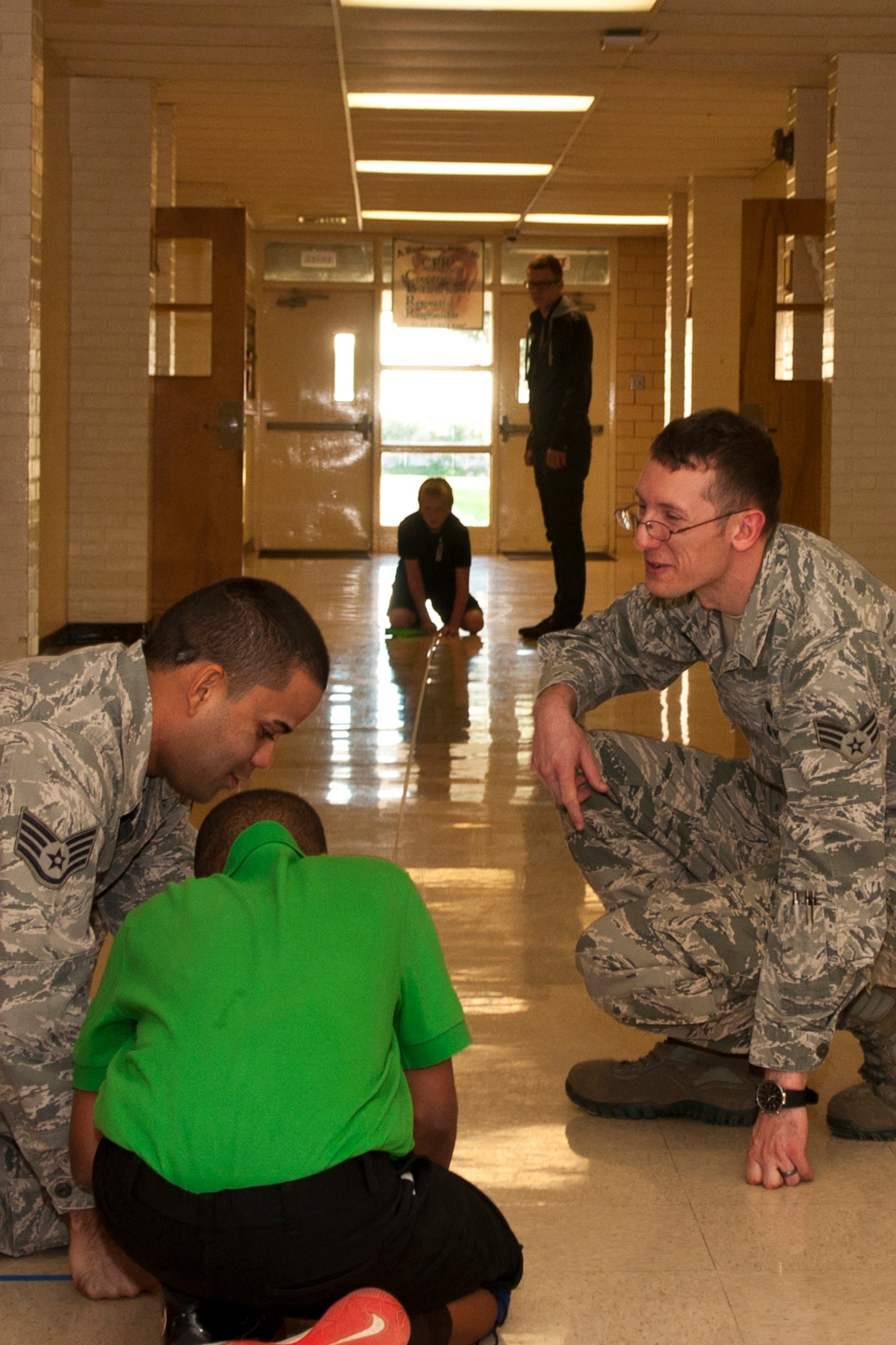 U.S. Air Force Airmen from Barksdale Air Force Base help students with an investigation into aerodynamics as part of the STARBASE 2.0 program in Bossier City, La., Oct. 23, 2014. STARBASE Louisiana is a 307th Bomb Wing sponsored program that encourages students to pursue studies in science, technology, engineering, and mathematics. (U.S. Air Force photo by Master Sgt. Dachelle Melville/Released)