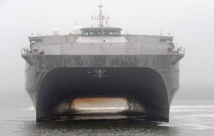 It was a foggy morning as USNS Choctaw County prepares to moor at Wharf ALPHA, Oct. 29, 2014, at Joint Base Charleston, S.C. The Choctaw County is a joint high speed vessel designed for rapid, intra-theater transport of troops and military equipment. The JHSV has a reconfigurable 20,000-square-foot mission bay area that can quickly adapt to support a number of different missions – anything from carrying containerized portable hospitals to support disaster relief to transporting tanks and troops. These ships are capable of transporting approximately 600 tons of military troops, vehicles, supplies and equipment 1,200 nautical miles at an average speed of 35 knots, and are designed to operate in austere ports and waterways, providing added flexibility to U.S. warfighters worldwide.