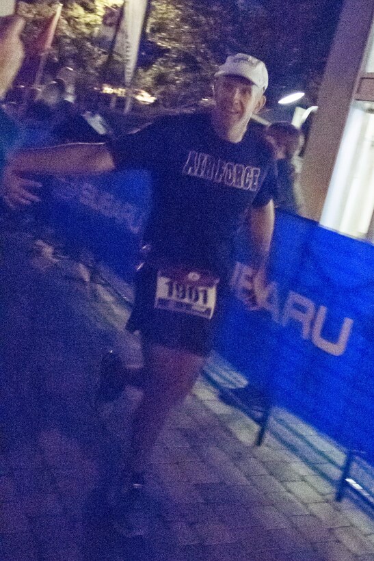 Technical Sergeant Andrew Lowe finishing the North American Ironman Championship in Mont Tremblant, Quebec, Canada.