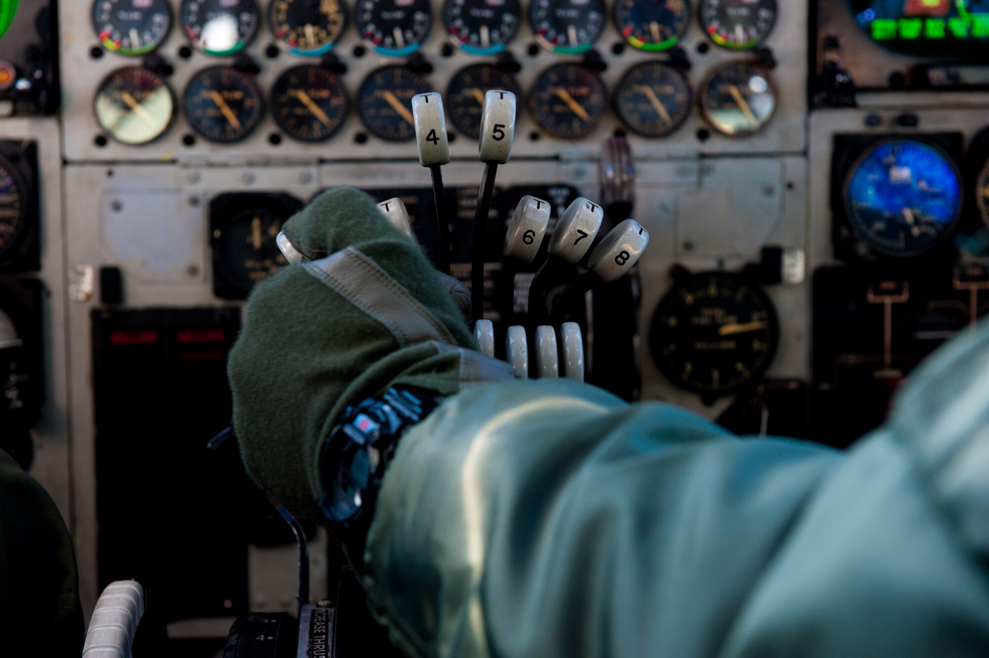 U.S. Air Force Capt. Creighton Moorman, a 23rd Bomb Squadron assistant training flight commander, adjusts the engine speed of a B-52H Stratofortress during a simulated nuclear response mission of Global Thunder 15 at Minot Air Force Base, N.D., Oct. 26, 2014. Global Thunder is a U.S. Strategic Command annual field training and battle staff exercise designed to exercise all mission areas with primary emphasis on nuclear command, control and communications. This field training and battle staff exercise provides training opportunities for components, task forces, units, and command posts to deter and, if necessary, defeat a military attack against the United States and to employ forces as directed by the president. (U.S. Air Force photo by Senior Airman Malia Jenkins)