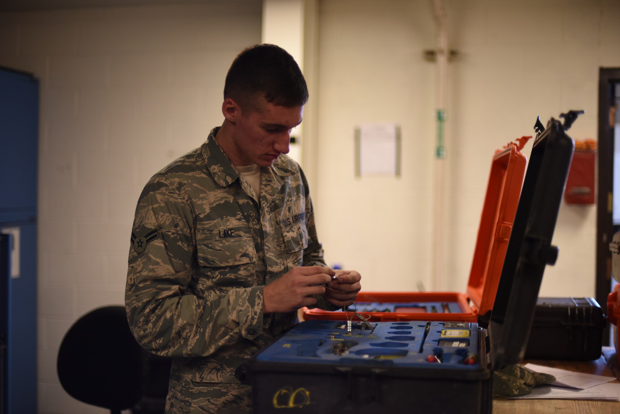 U.S. Air Force Airman 1st Class Drew Lake, a 341st Missile Maintenance Squadron tool technician, organizes and cleans a tool kit at Malmstrom Air Force Base, Mont., Oct. 20, 2014 during Global Thunder 15. During the exercise, maintenance personnel reviewed their procedures while performing day-to-day operations. Global Thunder is a U.S. Strategic Command annual field training and battle staff exercise designed to exercise all mission areas with primary emphasis on nuclear command, control and communications. This field training and battle staff exercise provides training opportunities for components, task forces, units, and command posts to deter and, if necessary, defeat a military attack against the United States and to employ forces as directed by the president. (U.S. Air Force photo by Airman 1st Class Collin Schmidt)