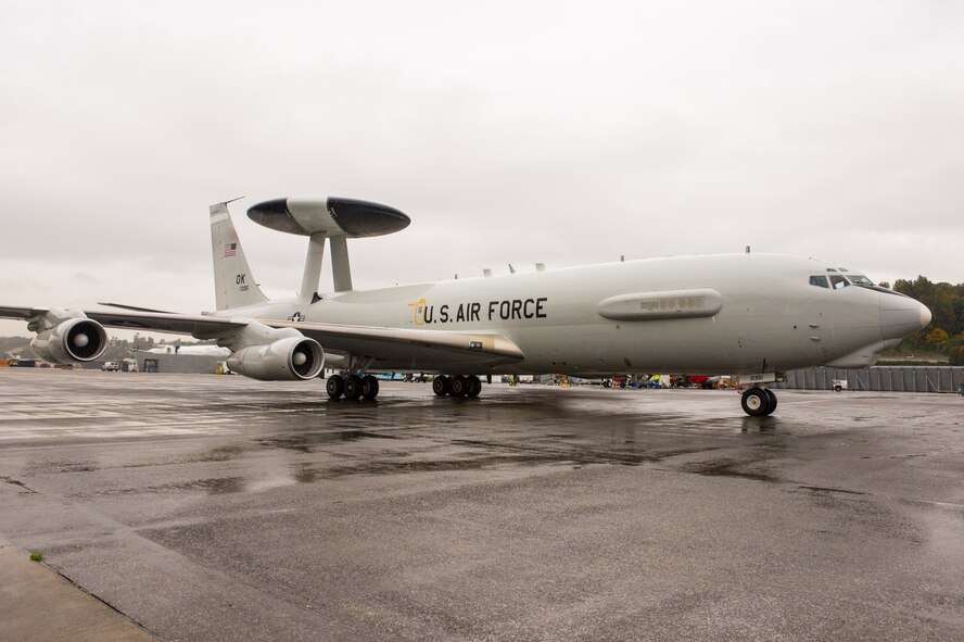 The DRAGON-qquipped U.S. Air Force E-3 AWACS aircraft, known as D-1, arrives at Boening Field in Seattle, Wash., Oct. 22 after a handoff from the U.S. Air Force. DRAGON is a Hanscom AFB based program, which stands for Diminishing Manufacturing Sources Replacement of Avionics for Global Operations and Navigation. DRAGON is also a cooperative development effort between the Air Force and NATO to upgrade the cockpits of both fleets. Following a three-month demodification process and a modification Installation & Checkout phase, the Service anticipates delivery of the D-1 fleet aircraft in early 2017. (Courtesy photo) 